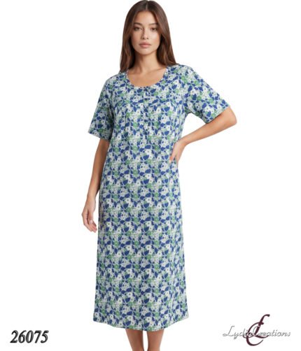 Model wearing a blue and green floral print midi dress with short sleeves, standing with one hand on hip.