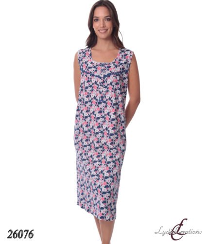 Model wearing a sleeveless floral midi dress in navy, pink, and white; product code 26076.