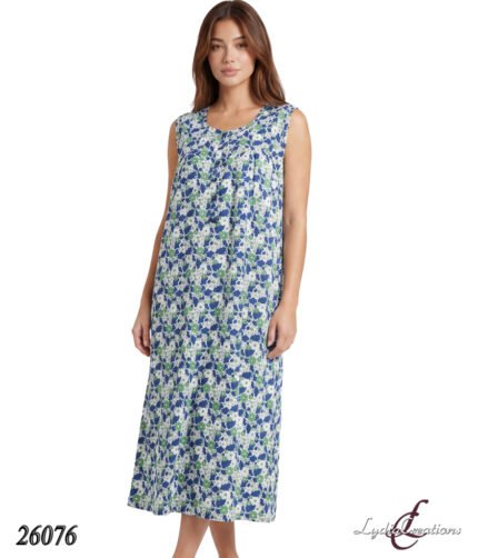Model wearing a sleeveless, ankle-length floral maxi dress in blue, green, and white on a white studio background with Lydia Creations logo nearby.