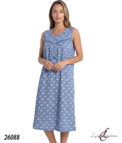 Blue sleeveless midi dress with small white bow print on a standing model; product code 26088.